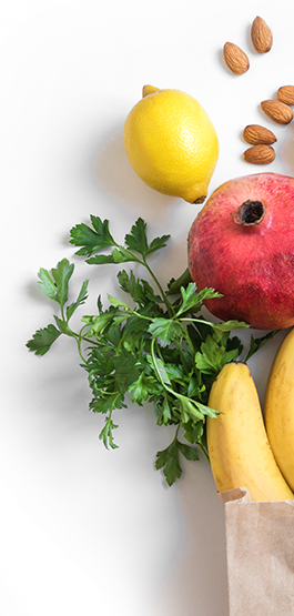 Fresh fruit and almonds in a bag.